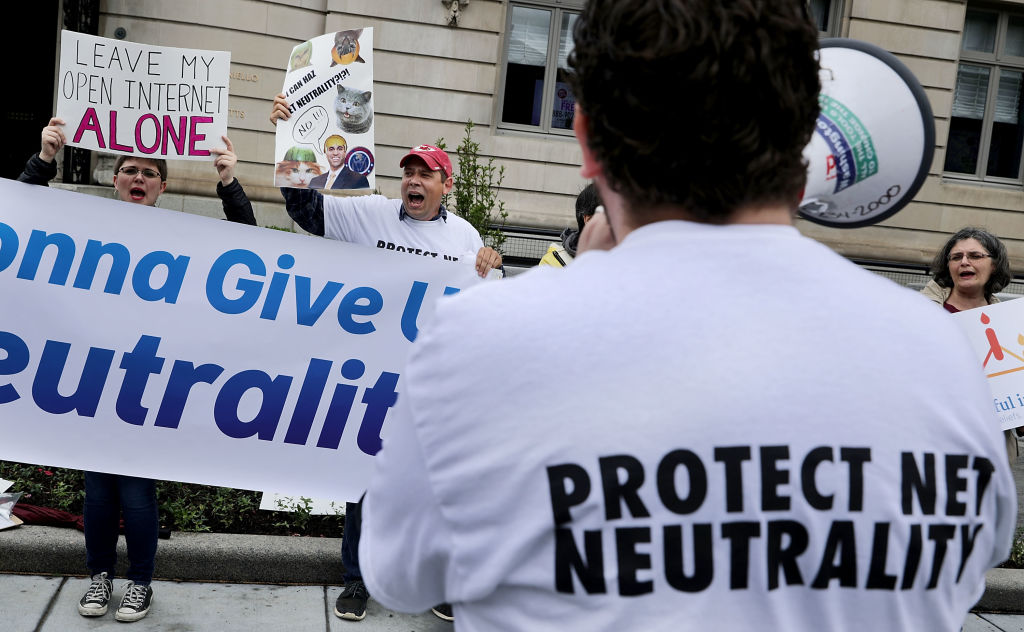 WASHINGTON, DC - MAY 05:  Proponents of net neutrality protest against Federal Communication Commission Chairman Ajit Pai outside the American Enterprise Institute before his arrival May 5, 2017 in Washington, DC. Appointed to the commission by President Barack Obama in 2012, Pai was elevated to the chairmanship of the FCC by U.S. President Donald Trump in January.  (Photo by Chip Somodevilla/Getty Images)