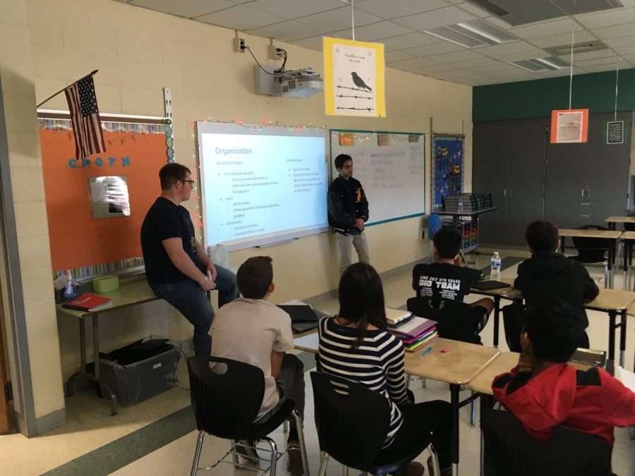 Davis Creach and Mo Khatami share their experiences with high school writing to Mrs. Deers English class at MMS