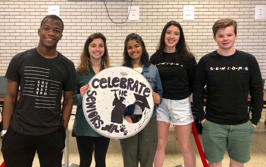 Class Council members Michael Mitole, Tonia Christou, Roma Ranade, Melanie Brkovich, and Reid Suddaby prepare for this Saturday's event.