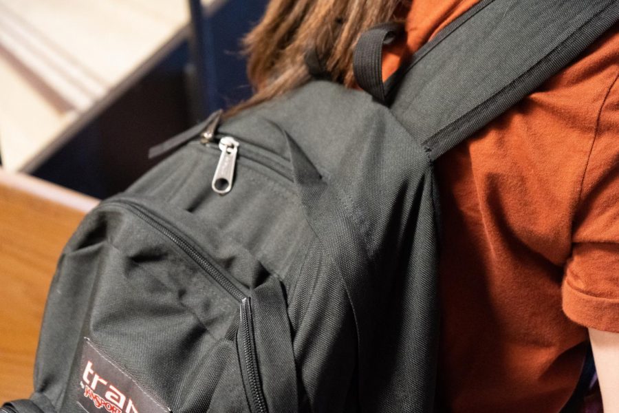 Lifting, carrying, and lugging around heavy backpacks can leave students with back pain and spinal issues.