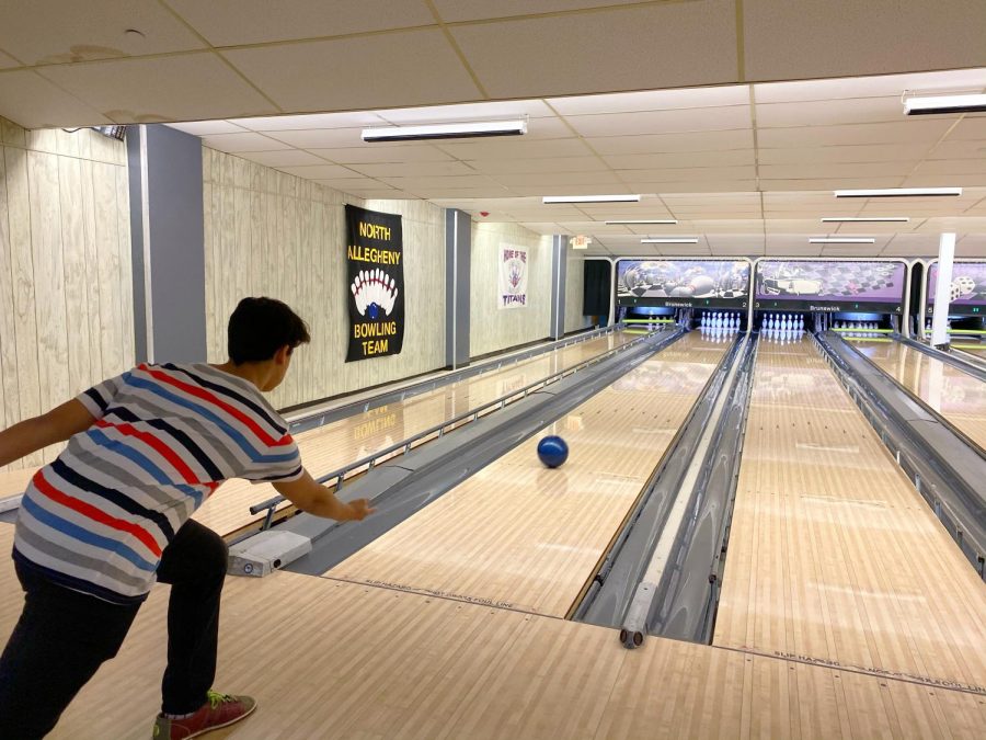 NASH junior Yaseen Sabil aims for a strike last Friday at Perry Park Lanes.  Sabil and others in the Muslim Student Association hosted a meeting at the bowling alley to build community around friendly competition, food, and fun.