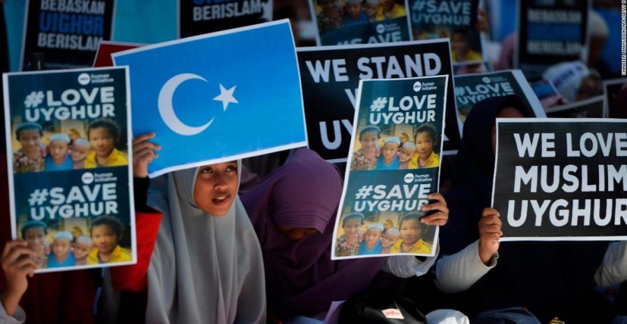 Social+activists+in+Indonesia+protest+the+Chinese+treatment+of+the+Uyghurs.