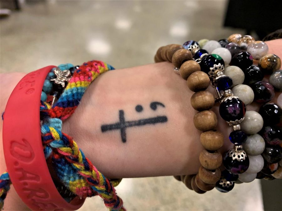 Madi Pittman, a junior at NASH, is one of the few students who has gotten a tattoo.