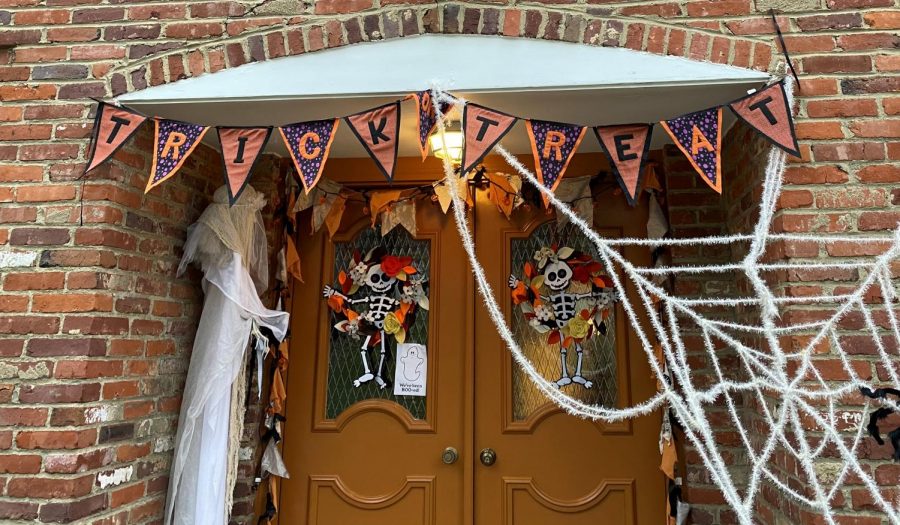 While the decorations around the door may look the same, traditional trick-or-treating should be anything but.