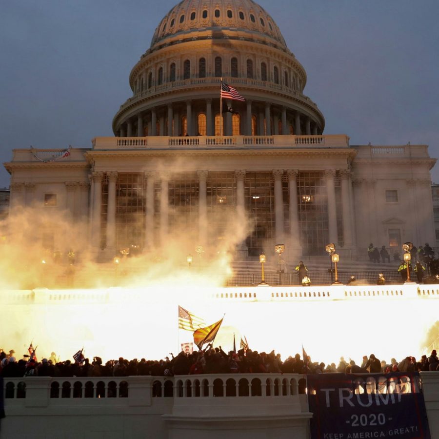 The insurrection at the Capitol on January 6th continued among flames.