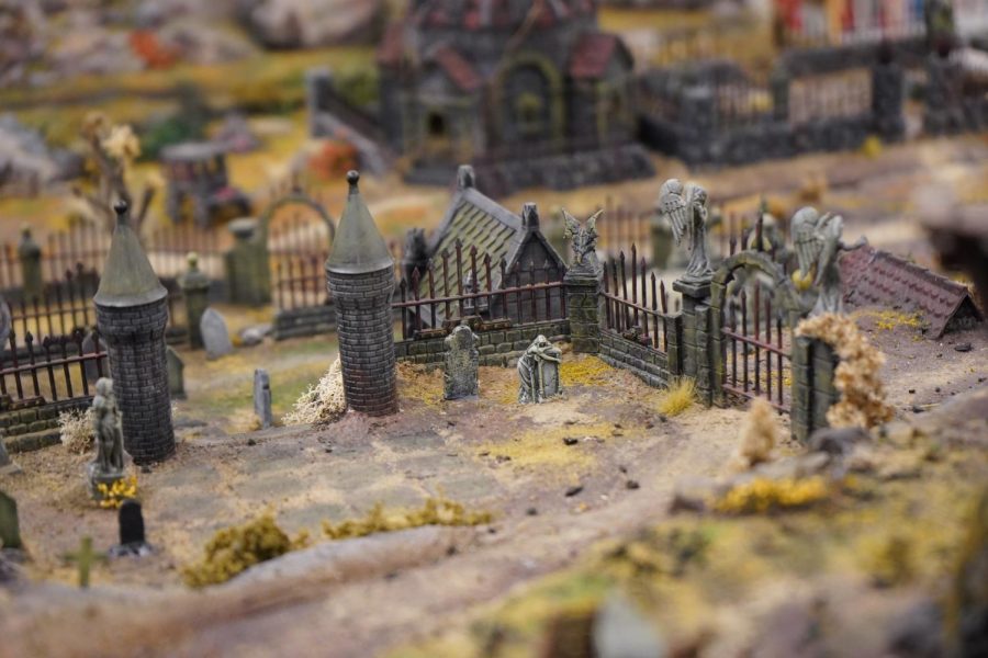 Mr. Rhinehart spent 18 months creating the 4x8 graveyard miniature now on display in the NASH library.