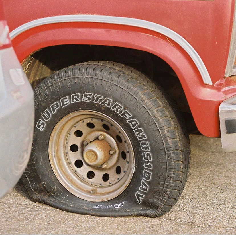 The wheel of this car, photographed by Matt Harmon, inspired the bands name. Harmons photo is the cover art for the groups upcoming EP Superstar.