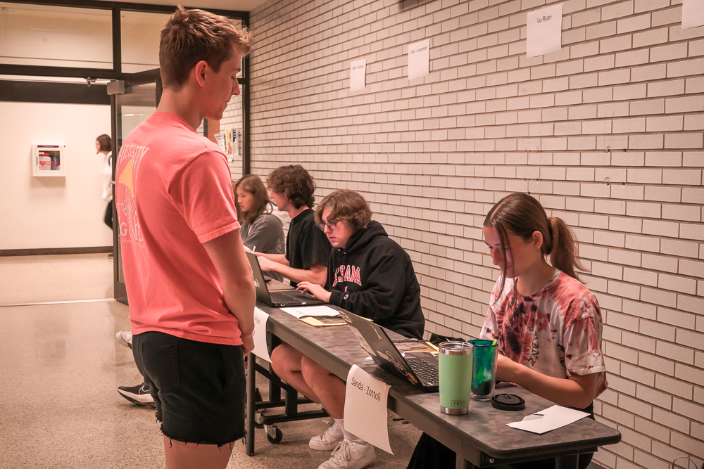 NASH senior Jacob Yarosz purchases his Senior Banquet ticket from Class Council during homeroom earlier this month. The council organized tickets sales for the banquet several weeks before the event on May 27th.