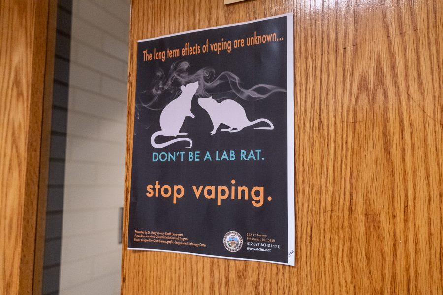 The anti-vaping poster on the door of the NASH Main Office alerts students to a serious risk: researchers have yet to determine the long-term side effects. 