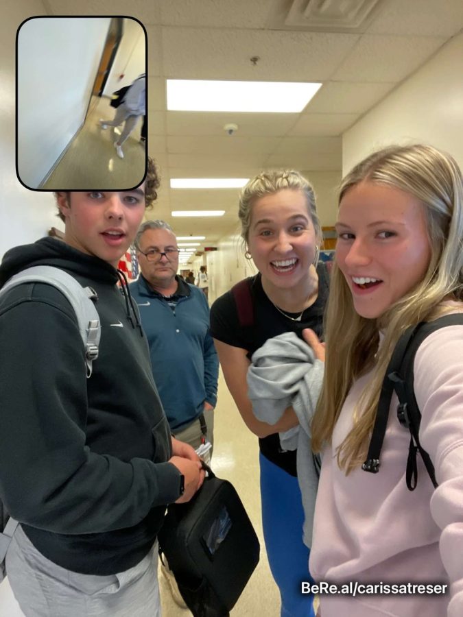 Carissa Tresser, Mia Tuman and Cam Ward pose for their daily BeReal with a surprise appearance from science teacher Mr. Walkowiak.