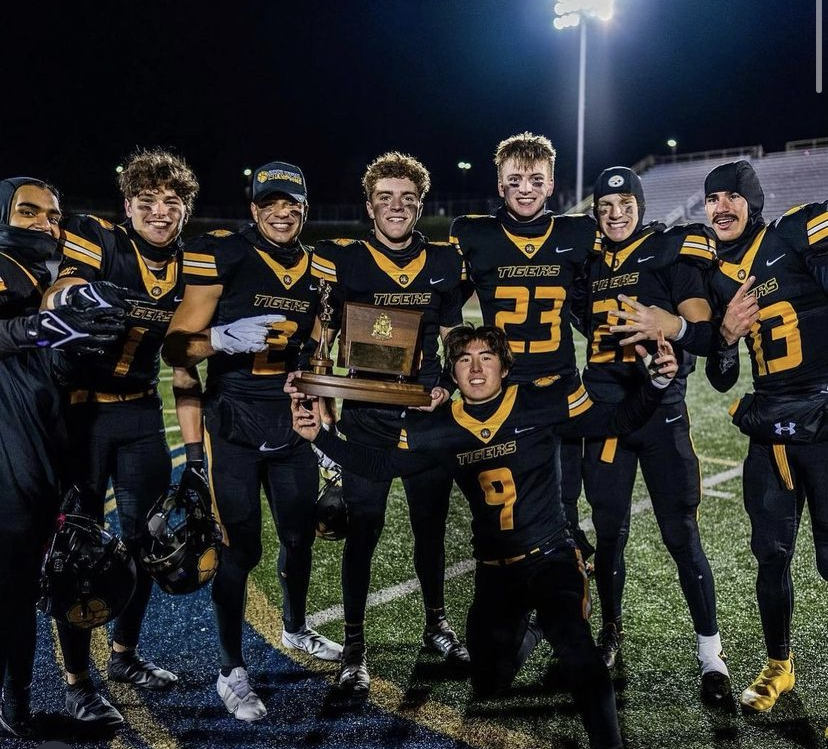 Seniors Gaurav Nayak, Rourke Kennedy, Anthony Varlotta,  Campbell Melzer, Nate Spak, Ian Zahorchak, Marco Pascarella, and Harron Lee celebrate after the win. 