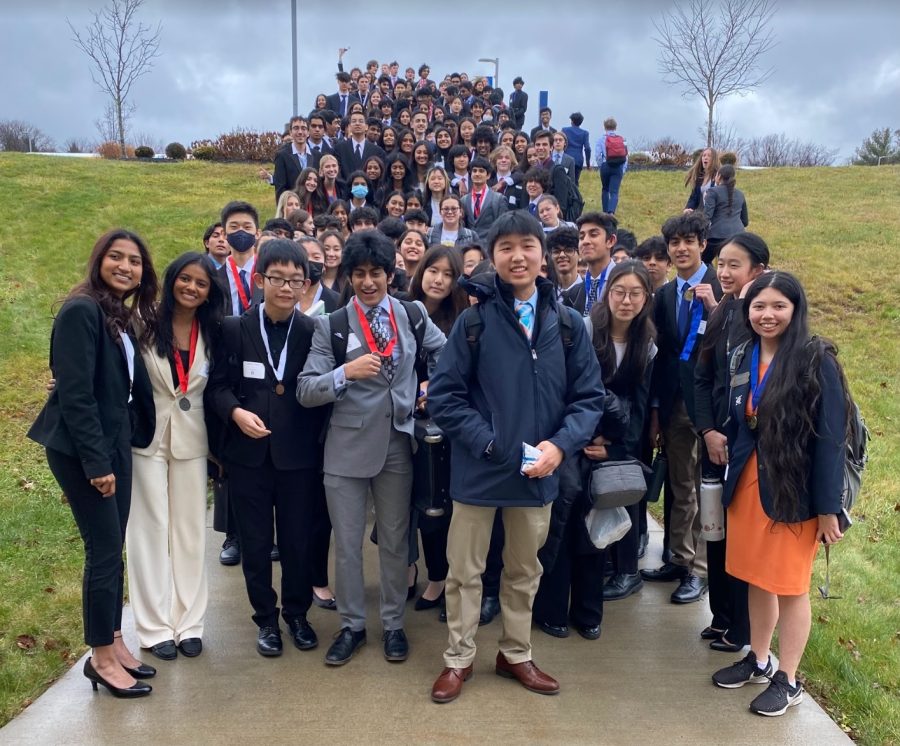 NA DECA poses for a picture after a record-breaking performance at the district conference last month.