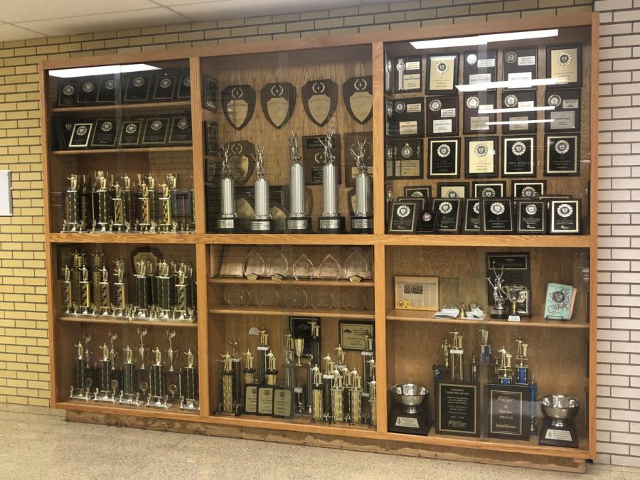 One half of the largest collection of awards at NASH--a collection that represents the talent, success, pride, and dedication of the forensics team.