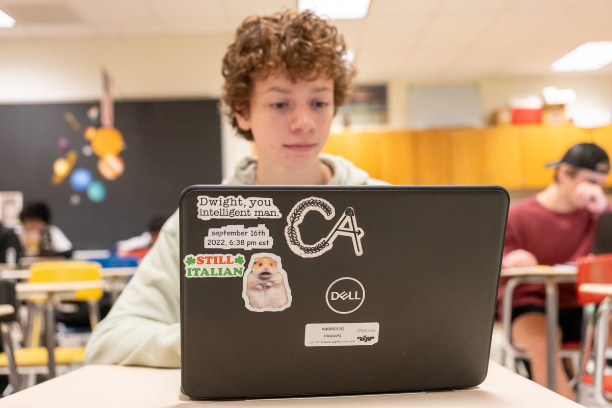 The mysterious sticker on Santino Scialabbas laptop has kept friends guessing for over two years.