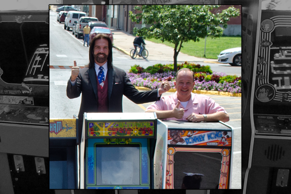 Billy Mitchell poses with his friend and ally, Steve Sanders. (“File:Billy Mitchell and Steve Sanders.jpg” by Datagod is licensed under CC BY-SA 4.0.)