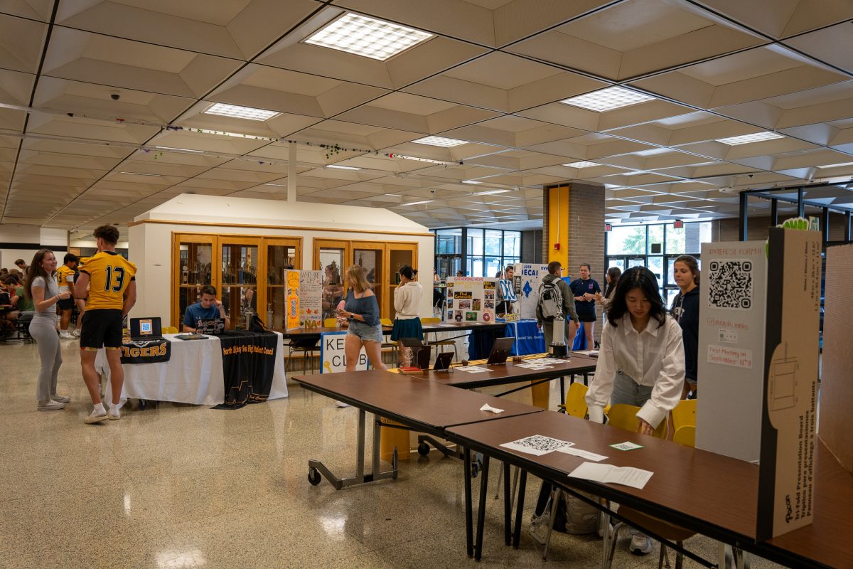 Clubs set up promotional tables beside the NASH cafeteria during lunches last Friday.