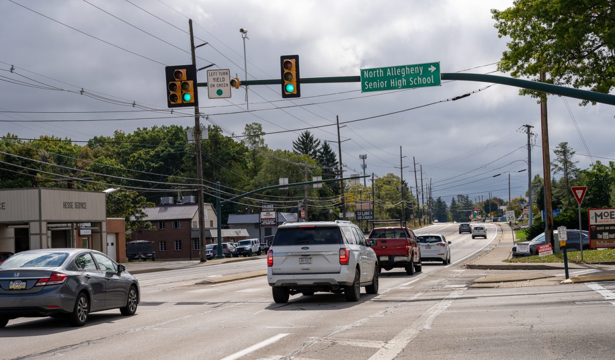 Cars navigate the traffic on Perry Highway