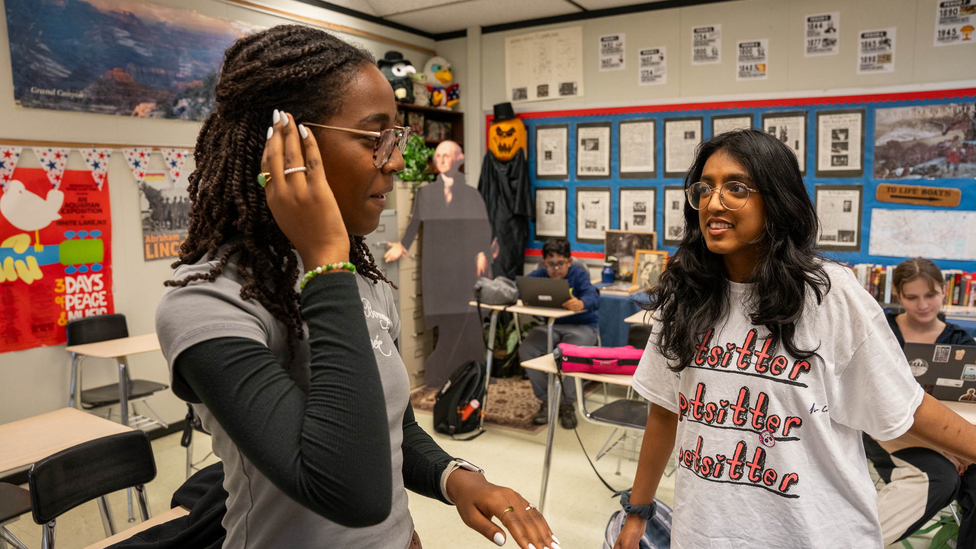 Alicia Gasana and Risa Rajeeve practice their Interp speeches after school in a third-floor classroom.