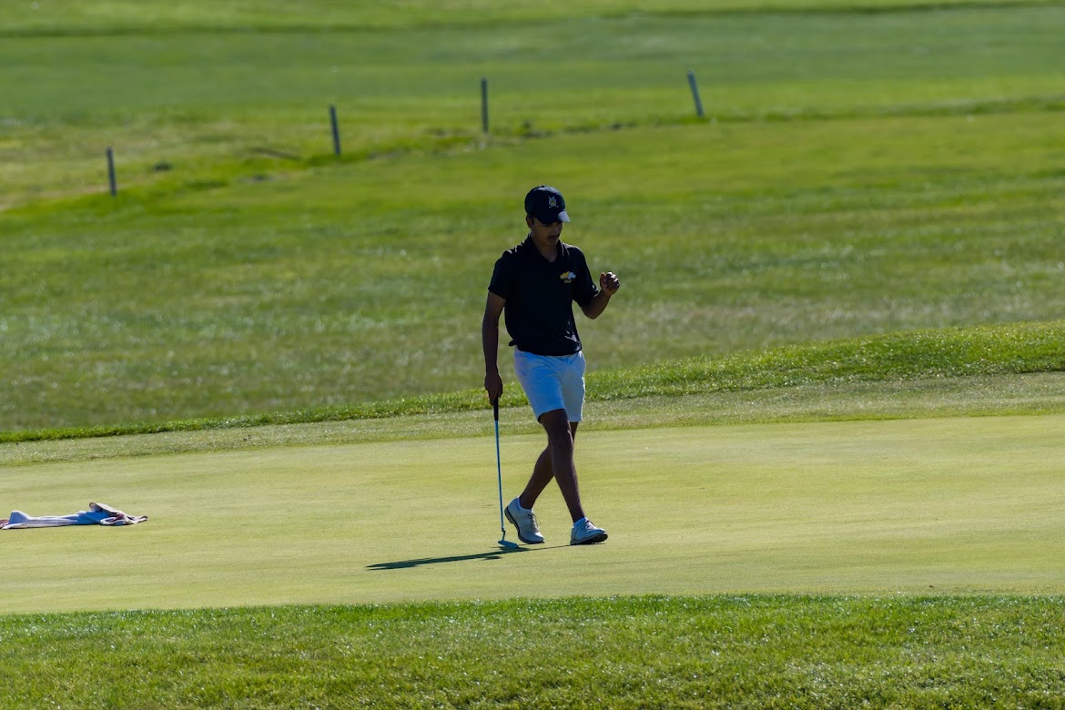 Desai pumps his fist after a strong round at the PIAA state championship.