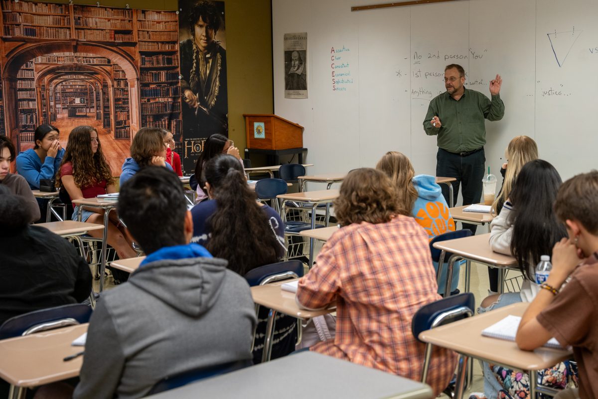 AP Lang teacher Mr. Rhinehart introduces his class to the argumentative writing skills during 2nd period.