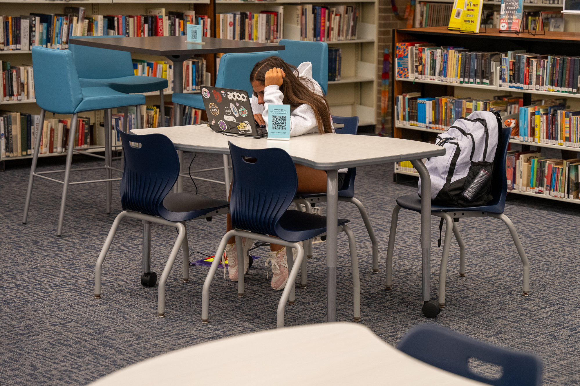 NASH senior Emma Schupansky studying in the library.