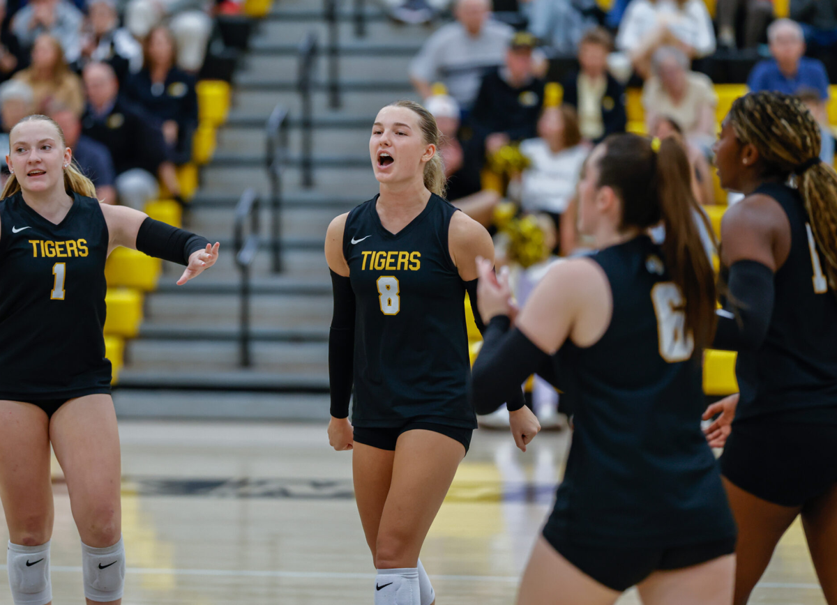 Junior Molly Robertson celebrates a point in an early-season match against the Shaler Titans. Robertson, a three-year starter, committed to Penn State over the summer.