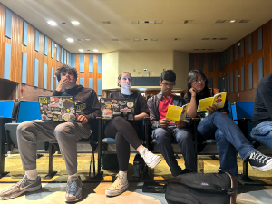 NASH student directors Jackson Wasielewski, Olivia Parsons, Ankit Pamula, and Layla Khalid observe a rehearsal in the NAI auditorium earlier this month. (photo: Laura Wells)