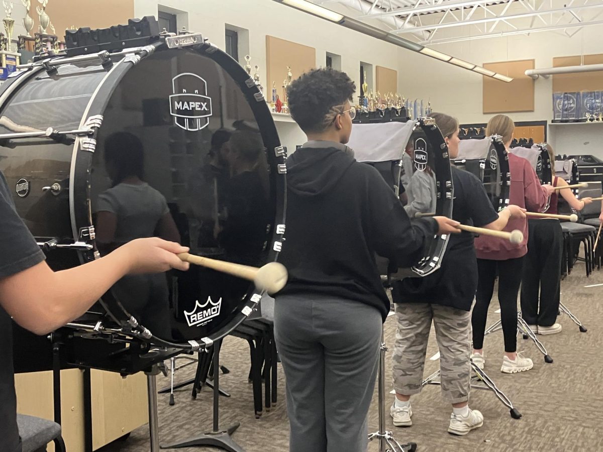 The NA Indoor bass line rehearses during a November workshop in the NASH band room.