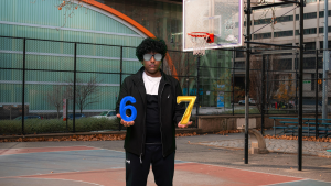 The author does the 67 meme, which originated in late 2024 and spread the following year when NBA players hopped on the trend. 