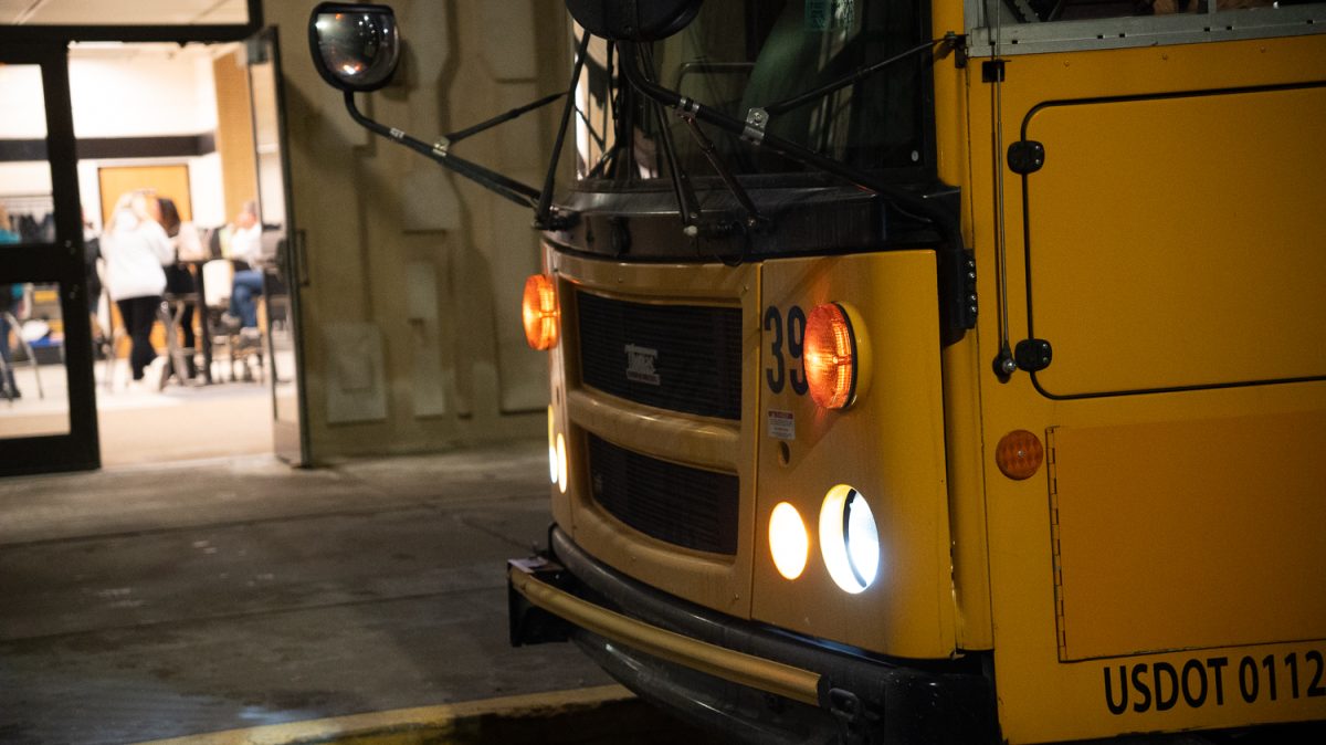 A bus arriving at NASH before the break of dawn.